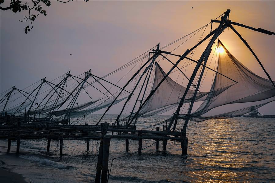 Chinese fishing nets at sunset in Kochi